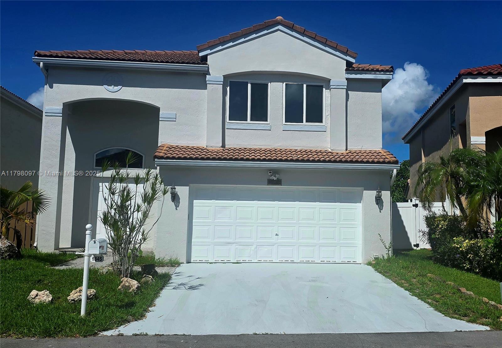 Hurry, back on market!! **Washer/dryer to be installed & landlord will consider installing back fence***Large 4 bedroom home boasts over 2500 sq ft and sits on a tranquil lake lot in a small, gated community. Don't miss out. PETS allowed. Brand new flooring throughout, fresh paint, updated kitchen with granite counters and stainless appliances. Two sets of French doors leading to large patio overlooking the water. Large living/dining and family room spaces equipped for large gatherings. Hurricane impact windows throughout, Accordian shutters for French doors. All bedrooms upstairs and are nicely sized. Double vanity in primary bathroom with combo tub/shower. Convenient location. Association approval & application fee apply