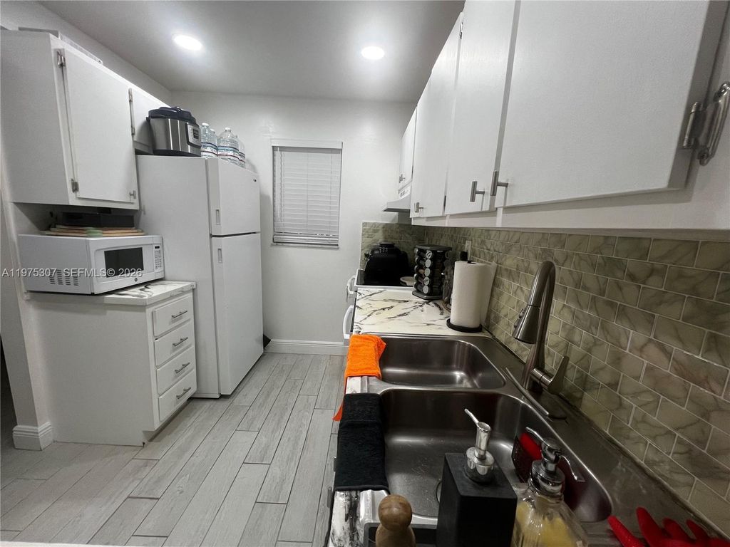 Photo of 7610 Stirling Rd #108-B, Hollywood, FL 33024 (MLS # A11975307)