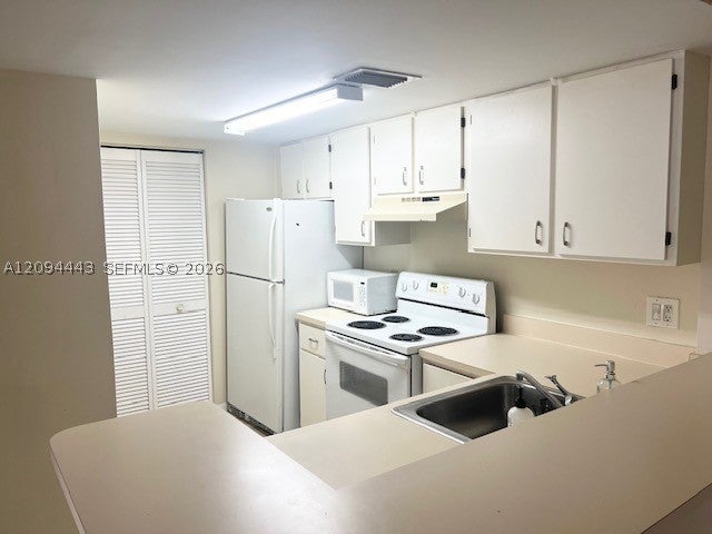 Photo of 10749 Cleary Blvd #307, Plantation, FL 33324 (MLS # A12094443)