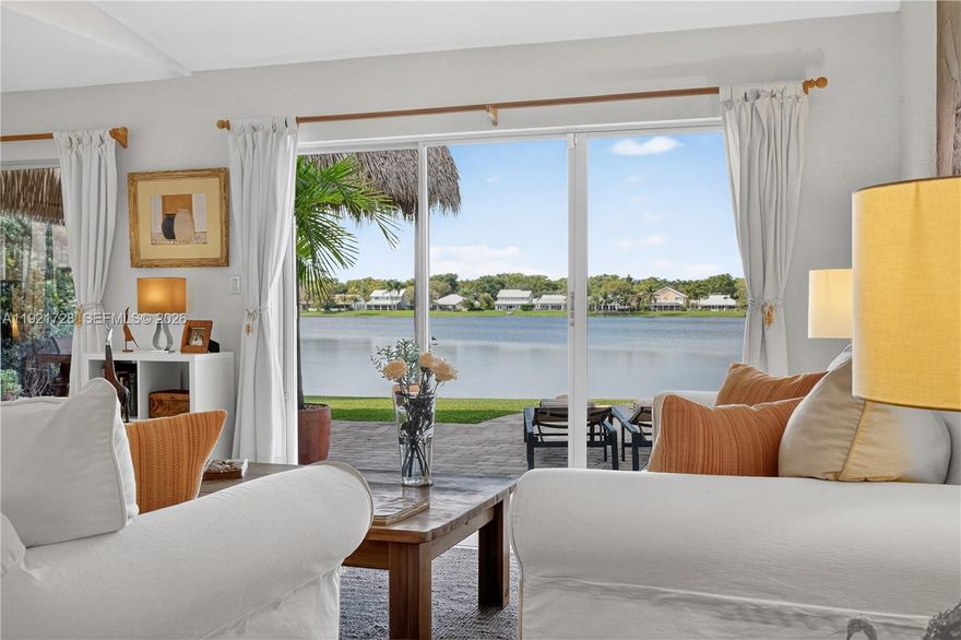 Experience true Florida lakefront living with year-round sunsets!
Lakefront pool home offering a calm, open layout and unobstructed water views from the main living areas and primary suite. Bright interiors, natural tones, and wood accents create a warm atmosphere. The backyard features a covered tiki area with fan, perfect for gatherings, plus a portable grill and a Cuisinart griddle on wheels.
House features 3 bedrooms + office/flex room, 2 bathrooms, impact protection (accordion and/or impact windows), salt-system pool, sprinkler with well, smart alarm, remote lock, auto-on lights, camera system. Pets OK.
Home is sold FULLY FURNISHED with a warm, natural aesthetic and custom wood furniture, including artisan pieces and quality décor. Some art pieces are not included, but all electronics and fixtures are, making this property truly move-in ready and ideal for relocations. Please tour the house through the ATTACHED PHOTOS.
HOA is paid quarterly and averages $98/month. It covers lake maintenance and community aesthetics management. Prime location east of Old Cutler Road, close to top schools, parks, and Black Point Marina. Cutler Bay is a booming city in Miami-Dade, with plenty of attractions. The home is located at "Lakes by the Bay" community, close to Turnpike, taking just a 35-minute drive—outside rush hour—to reach Miami International Airport. Built in 1996 under the significantly improved 1994 Building Code. Great opportunity to own this unique home! Easy to show!