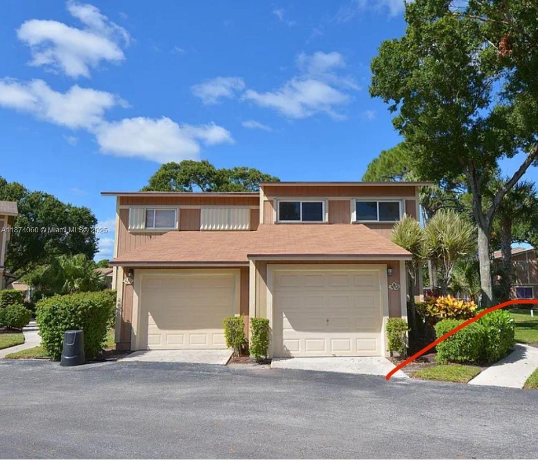 Fully updated 3 bedrooms 2 1/2 bath. Rare, desirable end unit, with extra large windows giving bright and cheery views throughout the house. 1 car garage townhouse in Jupiter. Renovated kitchen and features classic and clean white cabinetry, granite countertops and stainless steel appliances .Bathrooms remodeled with rich wood vanities, new fixtures and granite countertops.  Master bath comes with dual vanities and stand up shower with beautiful tile inlay.  Large windows, sliding glass door and cathedral cellings make for a light and bright feel.  Enjoy your free time on the large screened in patio overlooking a tranquil lake.  A rated school zone and only minutes from Abacoa Town Center, shopping and dining.  Full storm Shutters protection. Walking trail around lake. Easy to show