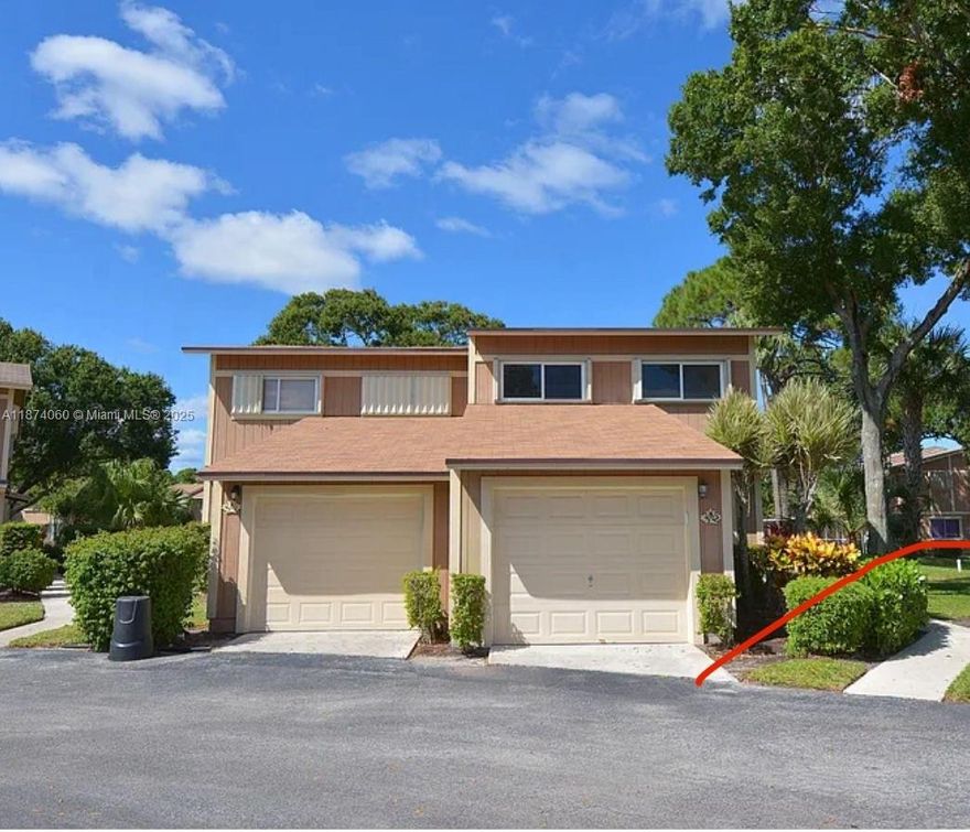 Fully updated 3 bedrooms 2 1/2 bath. Rare, desirable end unit, with extra large windows giving bright and cheery views throughout the house. 1 car garage townhouse in Jupiter. Renovated kitchen and features classic and clean white cabinetry, granite countertops and stainless steel appliances .Bathrooms remodeled with rich wood vanities, new fixtures and granite countertops.  Master bath comes with dual vanities and stand up shower with beautiful tile inlay.  Large windows, sliding glass door and cathedral cellings make for a light and bright feel.  Enjoy your free time on the large screened in patio overlooking a tranquil lake.  A rated school zone and only minutes from Abacoa Town Center, shopping and dining.  Full storm Shutters protection. Walking trail around lake. Easy to show