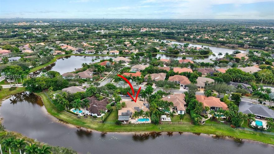 Spectacular waterfront home in the heart of Weston featuring 5 bedrooms 5.5 bathrooms plus office, 3 car garage, circular driveway and approximately 4,500 SF of beautifully updated living space on. This impressive residence offers soaring high ceilings, an open and airy floor plan, and abundant natural light throughout. Principal room with exercise room/office plus sitting area. The updated kitchen and renovated bathrooms provide modern comfort, while expansive living and entertaining areas make this home ideal for both family living and hosting. Step outside to your private resort-style backyard with saltwater pool system, Jacuzzi, tranquil water views, an amazing fully equipped outdoor kitchen with two grills and entertaining pavilion—perfect for gatherings and sunset evenings. Equipped with a top-tier, whole-home water softener and solar panels for significantly reduced electricity costs included in the price. Located in a well-maintained community The Landings close to A-rated schools, parks, shopping, dining, and major highways. A rare opportunity to own a move-in-ready waterfront home in one of Weston’s most desirable neighborhoods. Must see!!