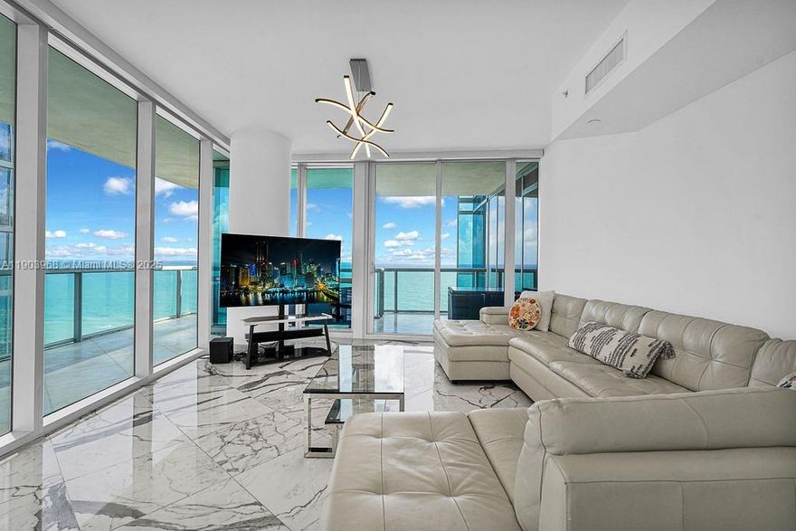 Experience luxury beachfront living in this 3-bed, 3.5-bath residence at Jade Ocean in Sunny Isles Beach. Located on a high floor, Unit 1808 offers breathtaking ocean and Intracoastal views. The 1,956 sq ft layout features a modern open design, floor-to-ceiling windows, and sleek finishes. Enjoy private elevator access, top-of-the-line appliances, and resort-style amenities including beach service, infinity pool, spa, gym, and 24/7 valet and concierge. Prime location near Bal Harbour and Aventura. A perfect blend of elegance, comfort, and coastal lifestyle.