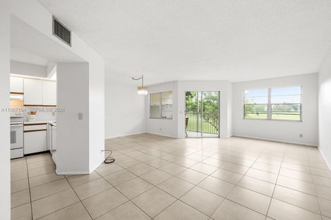 Photo of 901 SW 128th Ave #212E, Pembroke Pines, FL 33027 (MLS # A11997154)