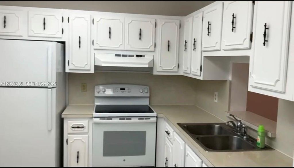Photo of 201 SE 11th Ter #302, Dania Beach, FL 33004 (MLS # A12033335)