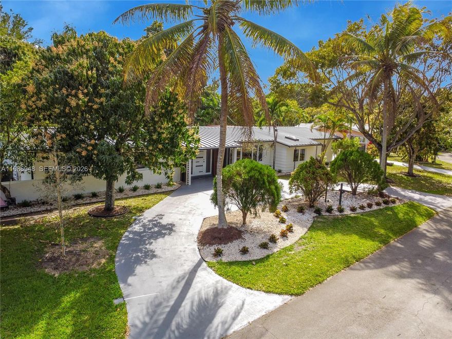 Impressive in both design and upgrades, this sophisticated smart home offers a seamless balance of style, technology and relaxed South Florida living. The residence features 5 bedrooms and 4 full bathrooms, including two spacious master bedrooms designed for comfort, privacy, and flexible living arrangements for extended family or guests. Elegant Italian flooring flows throughout the interior, complemented by a sleek Italian kitchen equipped with premium Miele appliances. A decorative fireplace creates a warm focal point that enhances the home’s modern design.
Extensive upgrades provide peace of mind and long term value, including new electrical, plumbing and air conditioning systems, along with impact windows and doors. Integrated smart features such as in ceiling speakers, LED lighting, smart toilets and central vacuum deliver a seamless blend of convenience and contemporary lifestyle.
Outdoor living is thoughtfully designed for relaxation and entertaining, highlighted by a pergola and a resurfaced pool with Diamond Brite finish, new equipment and pool heater for year round enjoyment. The property also offers mature Mango trees and additional side storage.
A private in law suite with full bathroom and a fully finished under air garage provide versatile space for guests, office, gym, or creative use. Ideally located near shopping, dining and within a highly desirable school district.