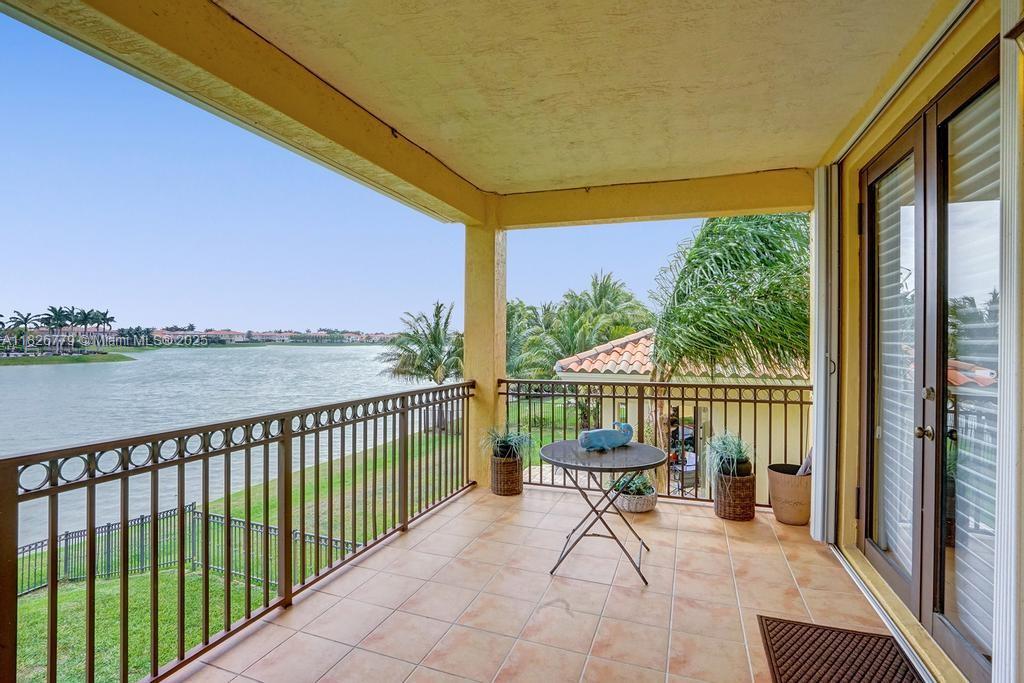 Large oversized Lakefront house & land lot in the gated community of Cutler Cay. Marble floors throughout. Second floor terrace. Detached separate Maids quarters/Guest house. 2 car garage plus a driveway that fits additional 2-3 cars. Access to the clubhouse with a large community pool, tennis courts, basketball courts, spa, gym and much more!