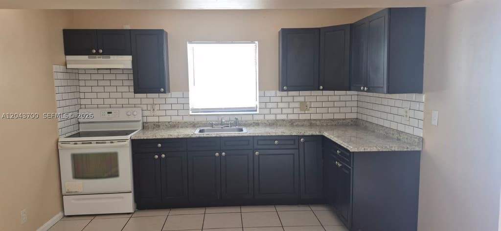 Photo of 4101 Riverside Dr #4, Coral Springs, FL 33065 (MLS # A12043700)