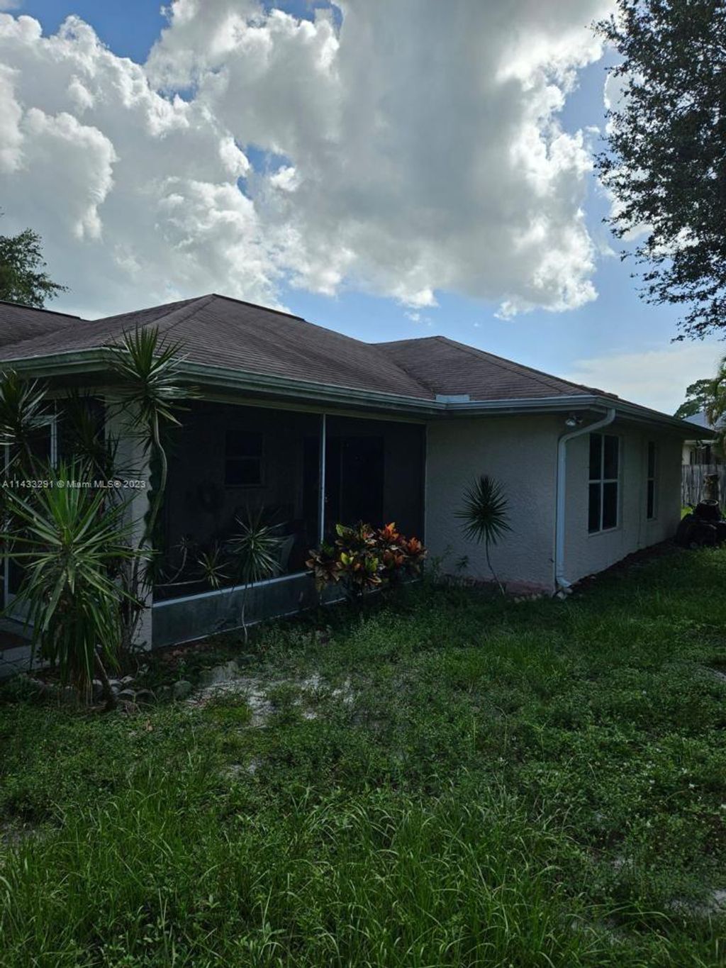 Photo of 389 NE Surfside Ave, Port Saint Lucie, FL 34983 (MLS # A11433291)