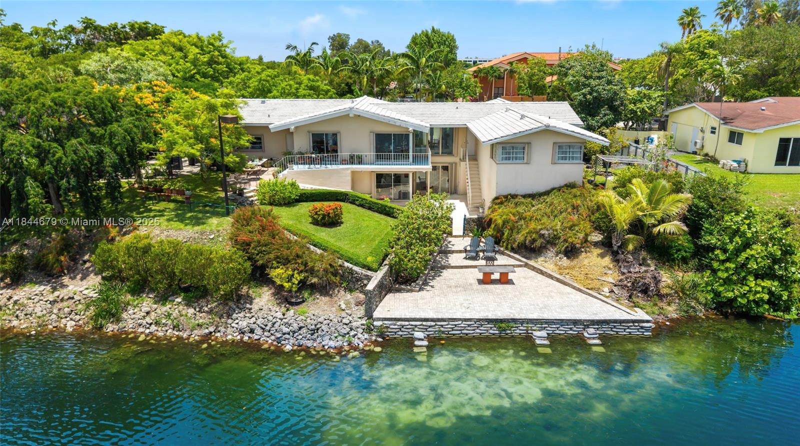 Beyond the buzz of the road lies a hidden sanctuary where time slows down and nature takes center stage. This spacious 3-bedroom, 2.5-bath home opens to sweeping lake views where water shimmers and wildlife graces your days in quiet harmony. Set on an expansive 17,880 sq. ft. The actual living area is 2,522 square feet. lot, the home feels like a world apart. Peaceful, silent, and alive with beauty. Step inside and leave the noise behind. Here mornings begin with birdsong and sunsets reflect golden across the water. A home not just to live in but to feel.