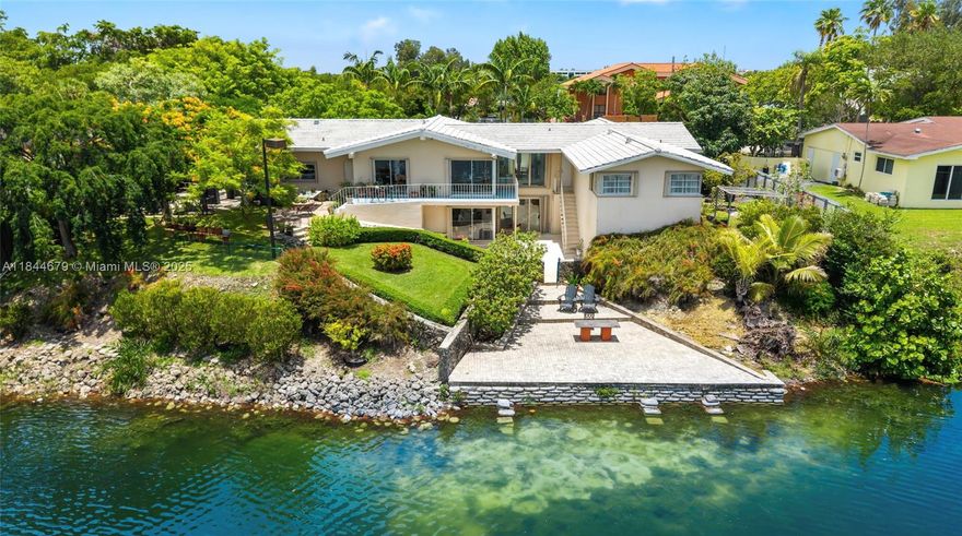 Beyond the buzz of the road lies a hidden sanctuary where time slows down and nature takes center stage. This spacious 3-bedroom, 2.5-bath home opens to sweeping lake views where water shimmers and wildlife graces your days in quiet harmony. Set on an expansive 17,880 sq. ft. The actual living area is 2,522 square feet. lot, the home feels like a world apart. Peaceful, silent, and alive with beauty. Step inside and leave the noise behind. Here mornings begin with birdsong and sunsets reflect golden across the water. A home not just to live in but to feel.