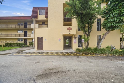 Photo of 3490 Foxcroft Rd #B303, Miramar, FL 33025 (MLS # A12093291)
