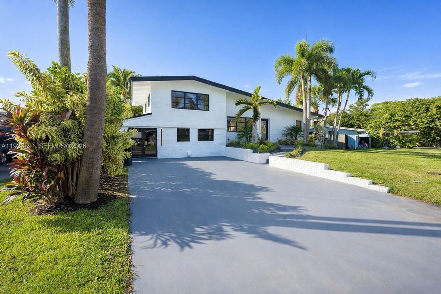 Welcome to this beautifully renovated waterfront home in the heart of Lauderdale Isles, Fort Lauderdale. Featuring 3 bedrooms, 3 bathrooms, and offering  the perfect blend of comfort and style, this property is perfect for those who love to entertain.    Enjoy the open-concept living area, updated kitchen, and seamless indoor-outdoor flow. Step outside to your private backyard oasis, complete with a jacuzzi, lanai, and large dock. With 55 feet of water frontage, it's ideal for boating or relaxing by the water.    Lauderdale Isles is a quiet neighborhood, offering convenience with its proximity to downtown Ft. Lauderdale, the airport, major highways, and just a 15-minute drive to the beach. This home offers the perfect blend of comfort, style, and the essence of South Florida living.