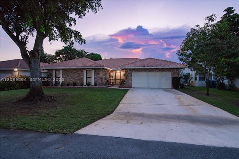 Photo of 4118 NW 69th Ter, Coral Springs, FL 33065 (MLS # A12099864)