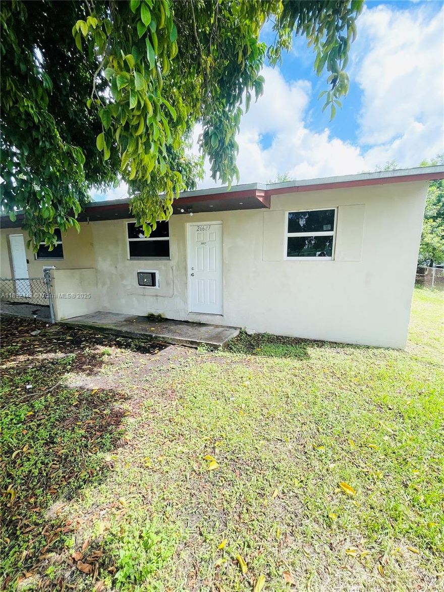 huge yard! two bedroom one bathroom unit in duplex. has its own street entrance, driveway and yard. chainlink fenced. unit comes with refrigerator and stove. Walled AC Units. Washer and Dryer hook ups. only asking for first month and one month security deposit. Section 8 welcome with a reduced security deposit.