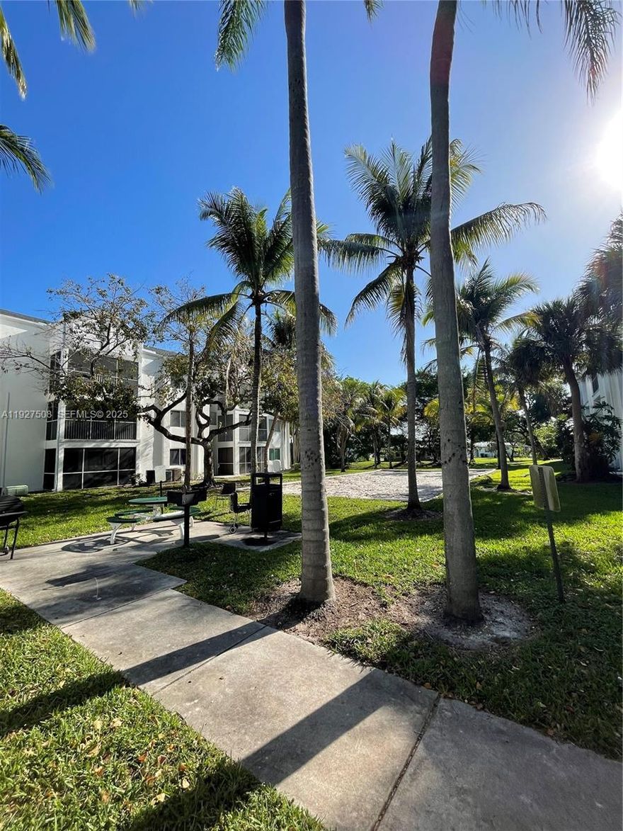 This inviting 1-bedroom, 1-bathroom apartment is move-in ready, boasting sleek wooden flooring throughout. The kitchen is thoughtfully designed with an open layout. No Association approval required. Perfectly positioned for easy access to commercial offices, shopping centers, schools, and major expressways, including the Turnpike. Managed on-site, this community offers a range of amenities, including a gated entrance, pool, exercise room, and clubhouse. Assigned parking is provided, along with ample guest parking. Nestled within a peaceful, close-knit neighborhood. Experience the warmth and tranquility of this family-friendly community. Easy to go and show!