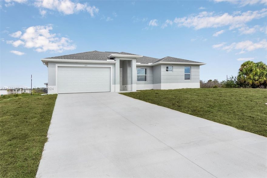Welcome to this stylish 3-bed, 2-bath concrete block home with a 2-car garage. Step inside to find tile flooring throughout, stainless steel appliances, and built-in cabinets with soft-close drawers. Enjoy the comfort of ceiling fans, city water, and a spacious lanai for outdoor relaxation. Don't miss out on this modern retreat! USDA 100% financing available to qualified buyers. The photographs are photos of the model home located at 135 Bethlehem PL Labelle FL. Colors, flooring, features may vary. 10k