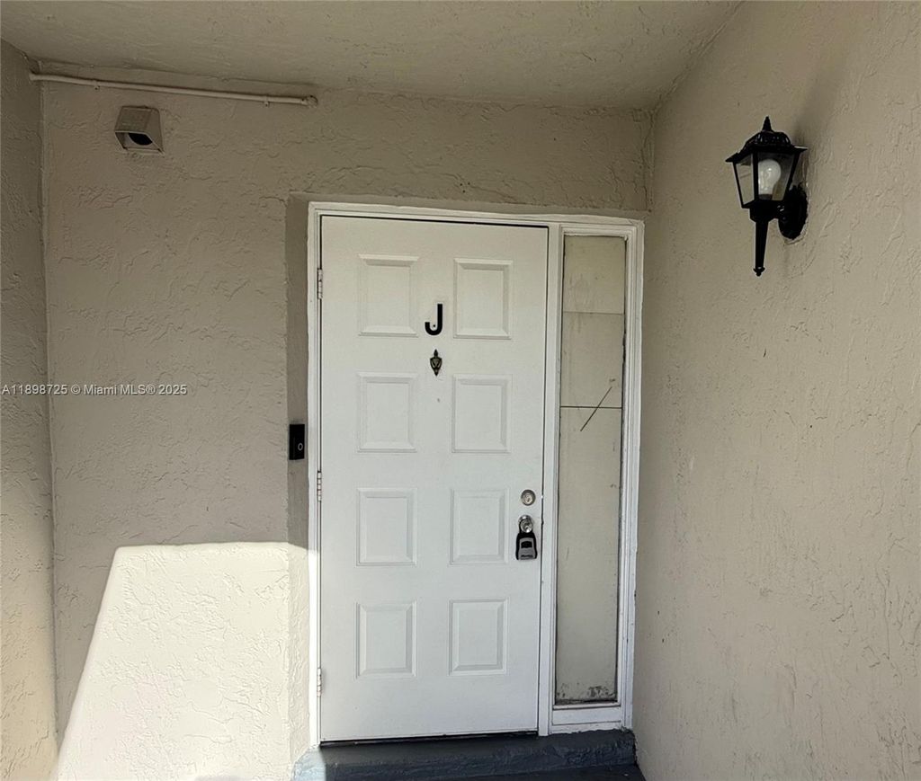 Photo of 1071 Adams Ave #1071J, Homestead, FL 33034 (MLS # A11898725)