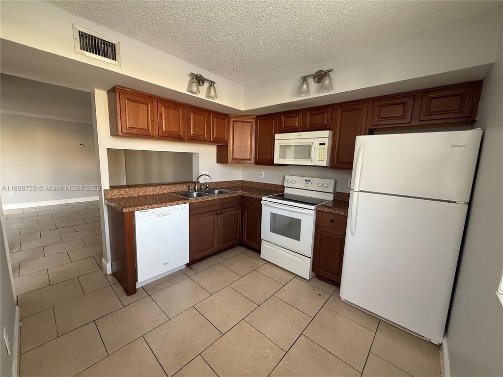 Photo of 1071 Adams Ave #1071J, Homestead, FL 33034 (MLS # A11898725)