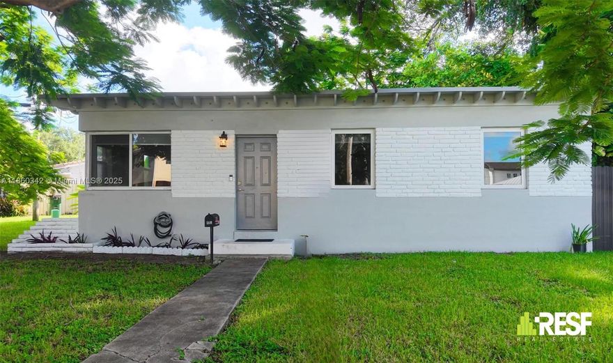 Welcome to 201 Flagler Ave in Miami Springs – a perfect starter home in a sought-after neighborhood. Featuring a new roof (2023), impact windows, updated AC (2019), partial repipe (2020), and a tankless water heater for peace of mind. Inside, enjoy a renovated kitchen with Taj Mahal quartzite countertops, all new appliances, plus a new washer and dryer. The large lot offers room to expand, garden, or design your dream outdoor space, park your boat or RV. Move-in ready with quality finishes throughout.