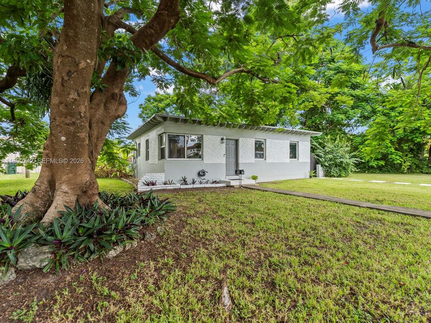 OVERSIZED 9,355 SF LOT | TURNKEY + EXPANSION POTENTIAL
Updated 3bed/2bath on rare oversized lot in prime Miami Springs. NEW roof, NEW AC, NEW flooring. Kitchen with Taj Mahal quartzite counters and stainless appliances, renovated bathroom. Move-in ready with major systems done.
THE OPPORTUNITY: This 9,355 SF lot nearly 3x typical Miami Springs size offers room to grow. Architectural renderings available showing transformation to 5-bedroom estate with pool and garage (conceptual only, representing one possible design). Live now, rent for income, or expand later.
Prime Flagler Drive location minutes to MIA Airport, downtown Miami, top schools. Large patio and expansive backyard ready for immediate enjoyment or future pool/garage addition.

Highlights: NEW roof/AC/flooring | Taj Mahal quartzite kitchen | 9,355 SF lot | Expansion plans available | Property sold as-is, renderings conceptual
Perfect for buyers seeking livability now with investment potential later. Schedule your showing today.
