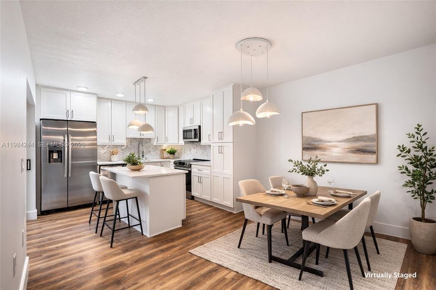 This beautifully updated townhouse sits just steps from the community pool & tennis courts. The home offers 3 bedrooms, 2.5 baths, including a flexible den that works perfectly as a third bedroom, home office, or guest space.
The entire home has been completely renovated from top to bottom with high-end finishes throughout. The kitchen & bathrooms have been fully redesigned, featuring imported Italian marble, brand-new stainless steel appliances, &
modern, clean finishes. New vinyl flooring runs throughout the home, tying everything together. You’ll love the  covered & screened patio, plus the additional open area that’s perfect for a small garden. This is the only unit in Glenwood currently renovated to this level, making it a rare, truly move-in-ready opportunity.