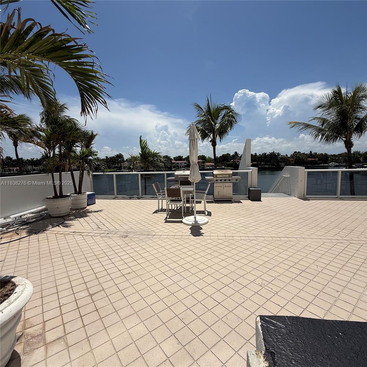 Boutique building-This 2/2 apartment with private oversize terrace and direct access to the common areas such as BBQs, Pool, Dock and much more. Bright unit recently remodeled and partially furnished. Cable/Internet included in rent. Laundry facilities on same floor. Beach and Boardwalk access right across from building. Unit can also be rented unfurnished. Walking distance to shops and restaurants. 1 assigned parking plus guest. NO Pets only asking first month and security.