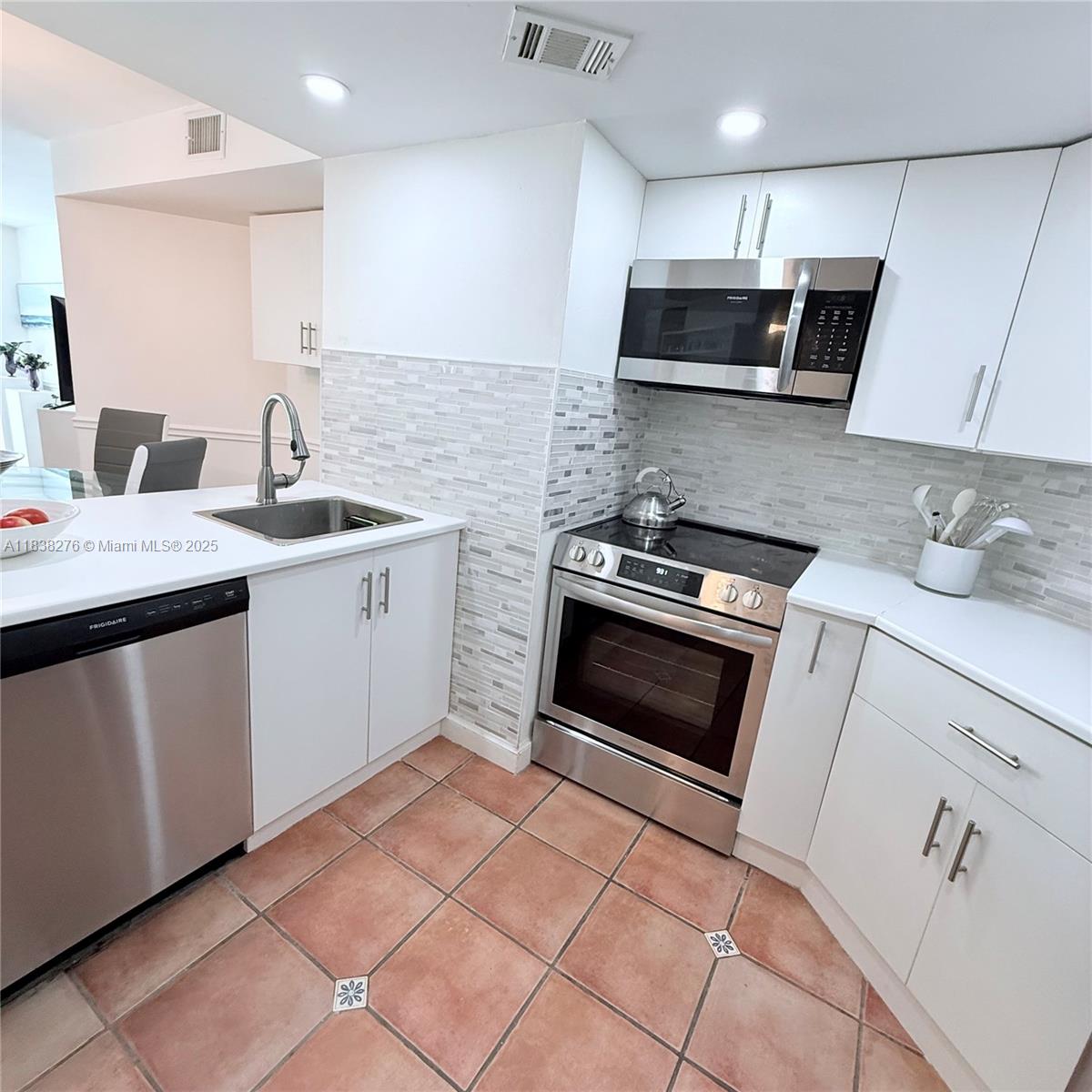 5880 Collins Ave 303