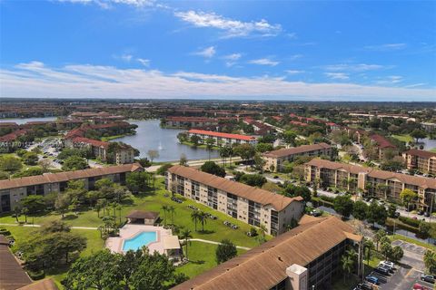 Photo of 12750 SW 15th St #107D, Pembroke Pines, FL 33027 (MLS # A11370157)