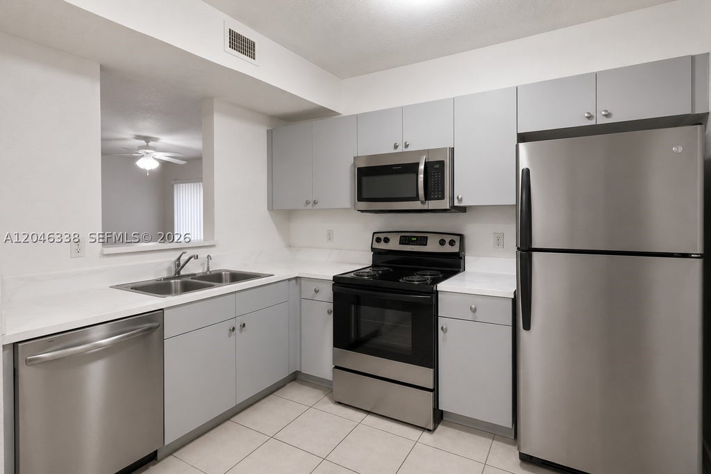 Photo of 1103 Golden Lakes Blvd #1013, West Palm Beach, FL 33411 (MLS # A12046338)