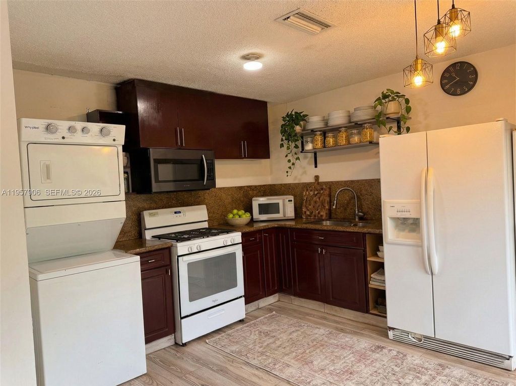 Photo of 2671 NW 87th Ln, Sunrise, FL 33322 (MLS # A11957906)