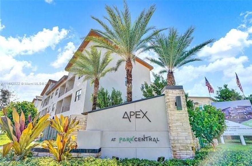 Apex in Doral Park Central, a resort style living. Beautiful 2 bedrooms, 2 full bathrooms (one on-suite) condo on first floor with fenced-in paved patio. Washer and dryer in the unit. Elegant kitchen featuring stainless steel appliances with granite countertops. Tiles, ceramic and laminate flooring throughout the unit. Open design that combines dining, kitchen and family room. Comes with full access to the resort style clubhouse equipped with swimming pool, fitness center, basketball court, tennis courts, yoga room, party room, BBQ area, kids play ground and water park and much more. Conveniently located in Doral, close to Schools, Shops, Banks, walking distance to Publix and Walgreens. Very near to Turnpike, Miami International Airport, Dolphin and International mall. A MUST see.