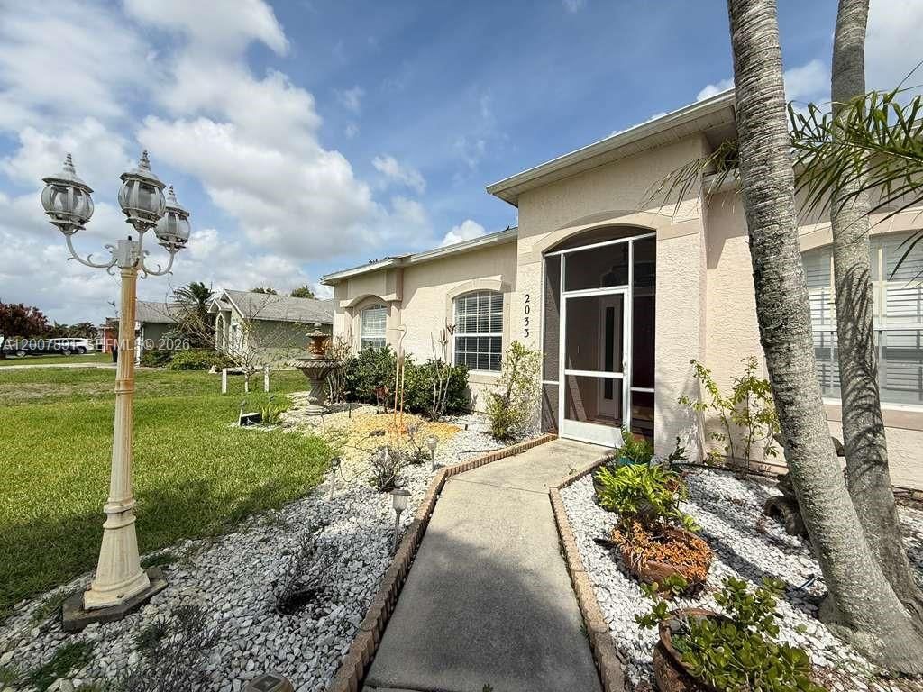 Photo of 2033 SW Beekman St #2033, Port St Lucie, FL 34953 (MLS # A12007891)