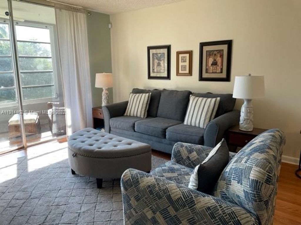 Photo of 9350 Sunrise Lakes Blvd #107, Sunrise, FL 33322 (MLS # A11314462)