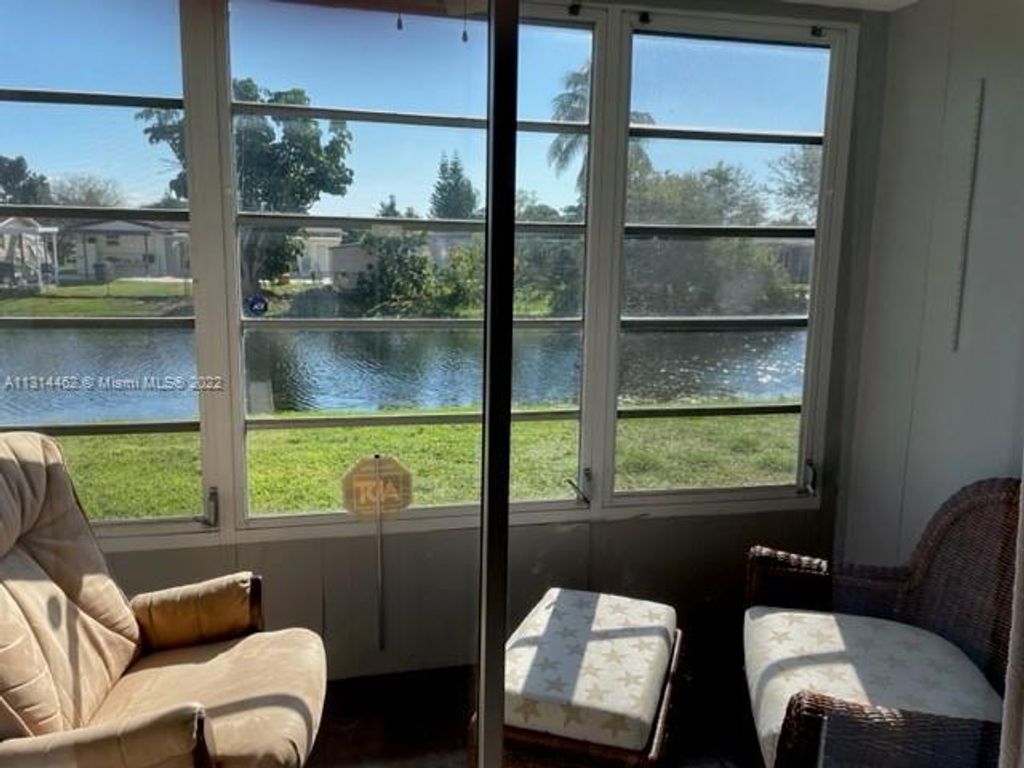 Photo of 9350 Sunrise Lakes Blvd #107, Sunrise, FL 33322 (MLS # A11314462)