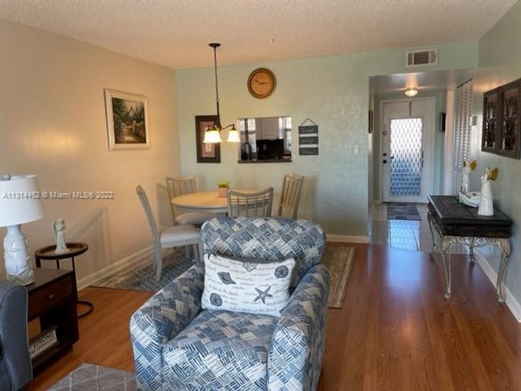 Photo of 9350 Sunrise Lakes Blvd #107, Sunrise, FL 33322 (MLS # A11314462)