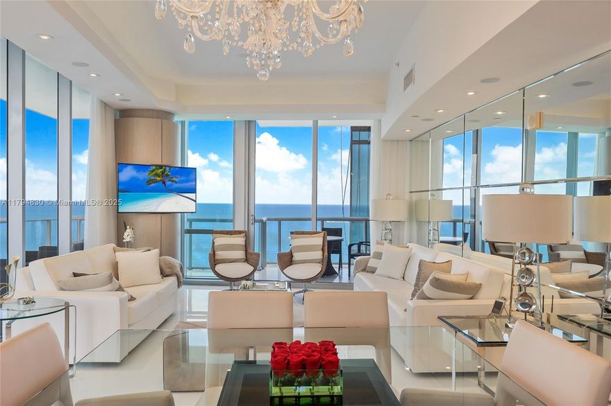 Stunning corner residence in Jade Ocean, Sunny Isles Beach’s iconic luxury tower by world-renowned architect Carlos Ott. This 3-bedroom, 3.5-bath home offers 1,956 SF of elegantly designed living space with direct, unobstructed views of the ocean, bay, and city skyline. Featured in DECOR Magazine and professionally decorated by Infinity Design’s Ronny Constansi, it includes private elevator entry, floor-to-ceiling impact glass, marble floors, smart home tech, surround sound, automated window treatments, and top-tier appliances. Offered furnished or unfurnished. Enjoy five-star amenities: two infinity pools, state-of-the-art fitness center, full-service spa with lounge, private cinema, kids’ playroom, 24/7 concierge, valet, and exclusive beach club. Luxury living redefined.