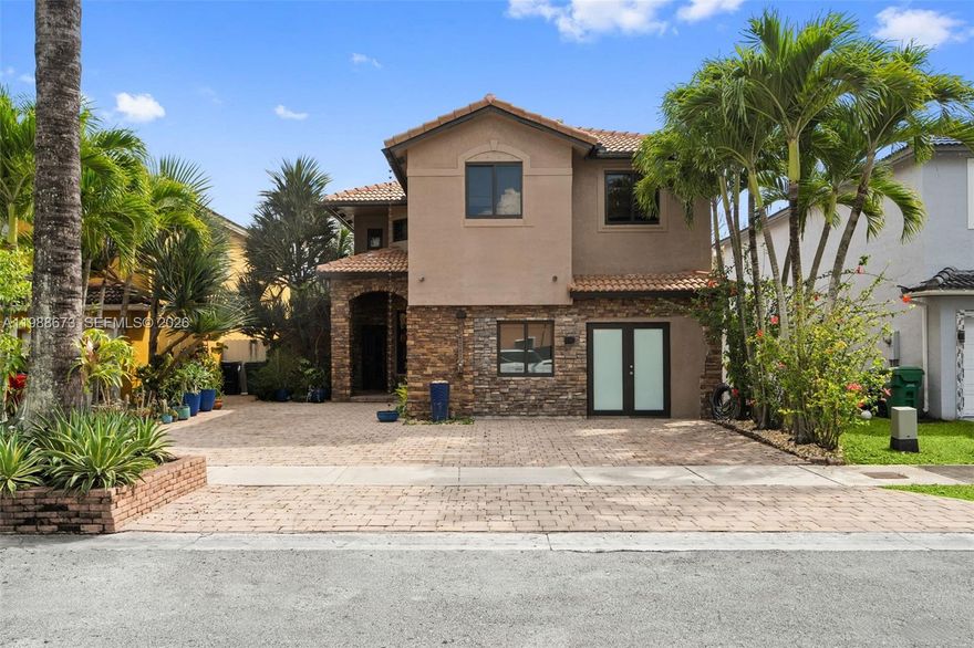 Well Maintained completely remodeled two story single family home, 4 bedrooms 3 full bath + 2 half baths! converted garage with permits, concrete terrace and balcony. No rear neighbors for extra privacy!