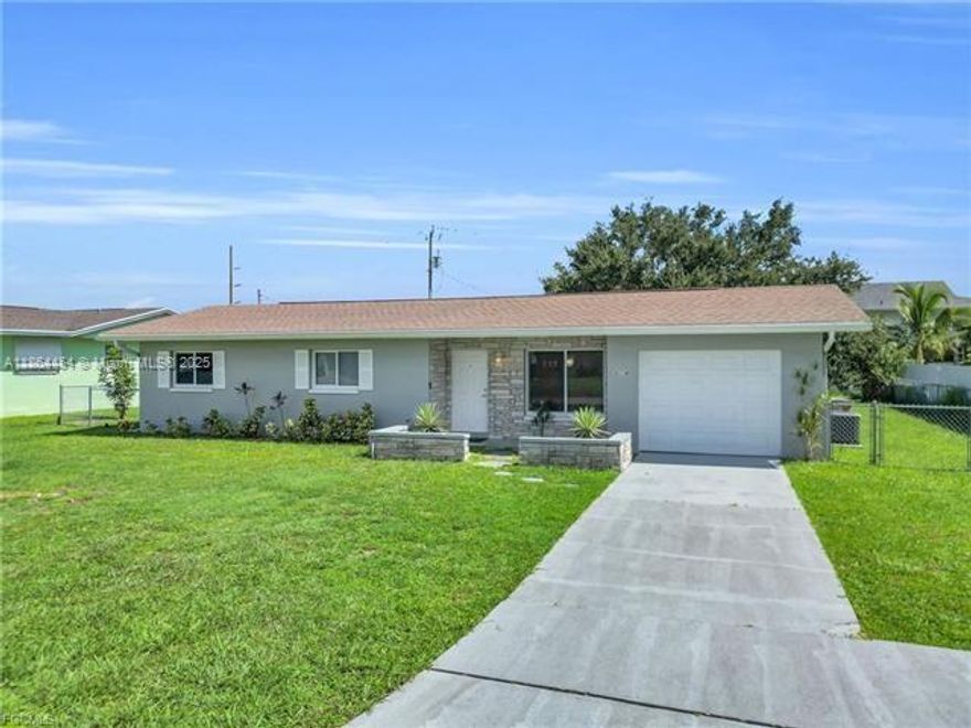 Welcome to this beautifully updated 3-bedroom, 2-bath home with 1,166 sq. ft. of living space and 1,798 sq. ft. total. Features include quartz countertops, stainless steel appliances, remodeled baths with porcelain tile and frameless glass showers, plus elegant new fixtures. Impact windows (50% of home), screened patio, newer HVAC (2018), LED recessed lighting, pendant lights, updated interior doors, garage with laundry and lateral door, and newer water heater. Roof replaced in 2020. Current lease offers investor potential. Conveniently located near schools, shopping, dining, and with easy access to Fort Myers.