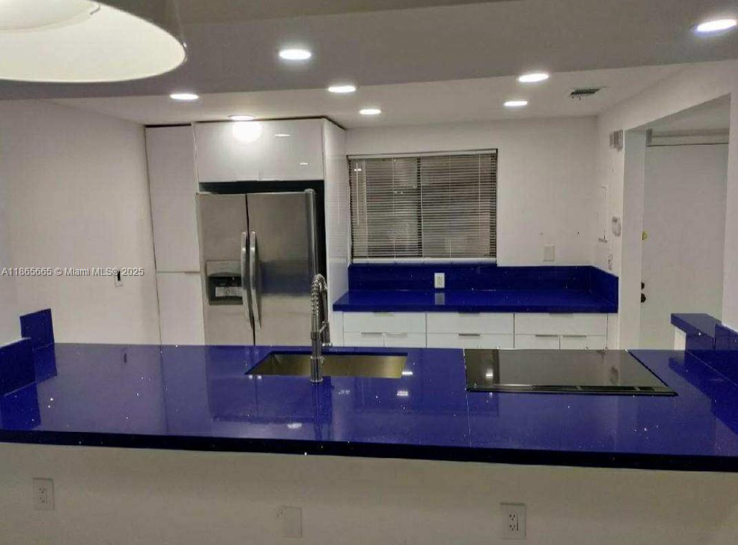 Spacious 2-bedroom, 2-bathroom rental in an unbeatable location! Just first month and 1.5-month deposit to move in. Ideally situated near Miami Dade College, Dadeland Mall, Turnpike, Palmetto Expressway, and Baptist Hospital. This first-floor unit features a renovated kitchen, open layout, in-unit washer and dryer, tile flooring throughout, and a private terrace. Assigned parking included. The well-maintained community offers fantastic amenities including 2 pools, tennis courts, gym, billiards room, and more. Don’t miss this great opportunity