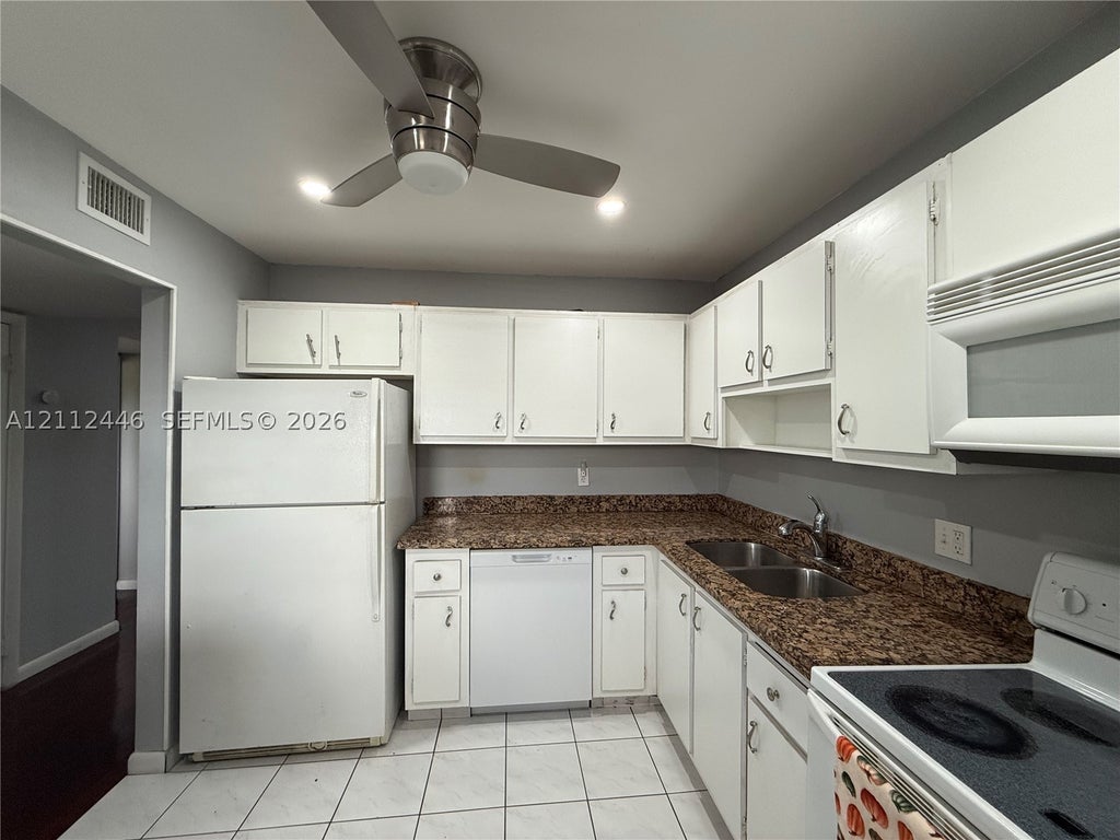Photo of 6100 S Falls Cir Dr #411, Lauderhill, FL 33319 (MLS # A12112446)
