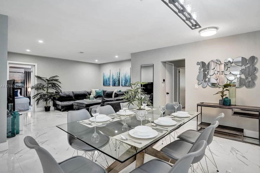 Step into this beautifully updated 4-bedroom, 3-bathroom home in the sought-after Hollywood Lakes neighborhood. Recently renovated, this move-in ready gem boasts 1,714 sq ft of stylish living space with a modern open layout. Enjoy Florida's sunshine year-round with your own private pool, just two years old, set within a lush backyard. Located just minutes from the beach, this home offers the perfect blend of comfort, convenience, and coastal charm. A fantastic opportunity to own in one of Hollywood's most desirable areas!