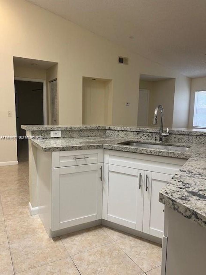 Spacious and Bright 2Bed/2Bath Condo, Kitchen Cabinets with Granite Counter Top Stainless-Steel Appliances, Washer and Dryer Inside the Unit. ** Updated Bathrooms** Storage. Minimum Credit Score of 650 as per Association. Great Location, Near Schools, Restaurants and Sawgrass Mall. ** Easy to show. **