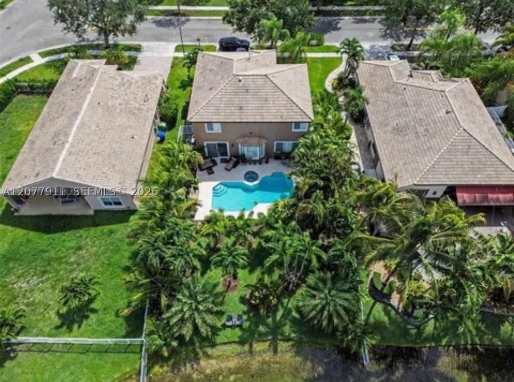 Photo of 1532 NW 133rd Ave, Pembroke Pines, FL 33028 (MLS # A12077911)