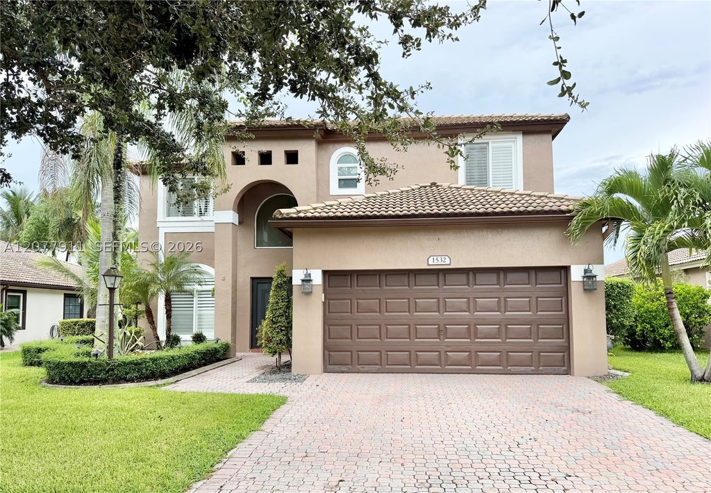 Photo of 1532 NW 133rd Ave, Pembroke Pines, FL 33028 (MLS # A12077911)