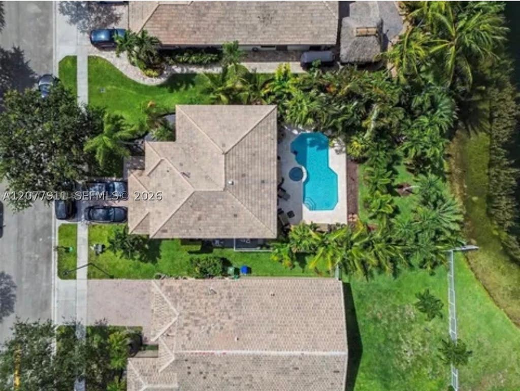 Photo of 1532 NW 133rd Ave, Pembroke Pines, FL 33028 (MLS # A12077911)