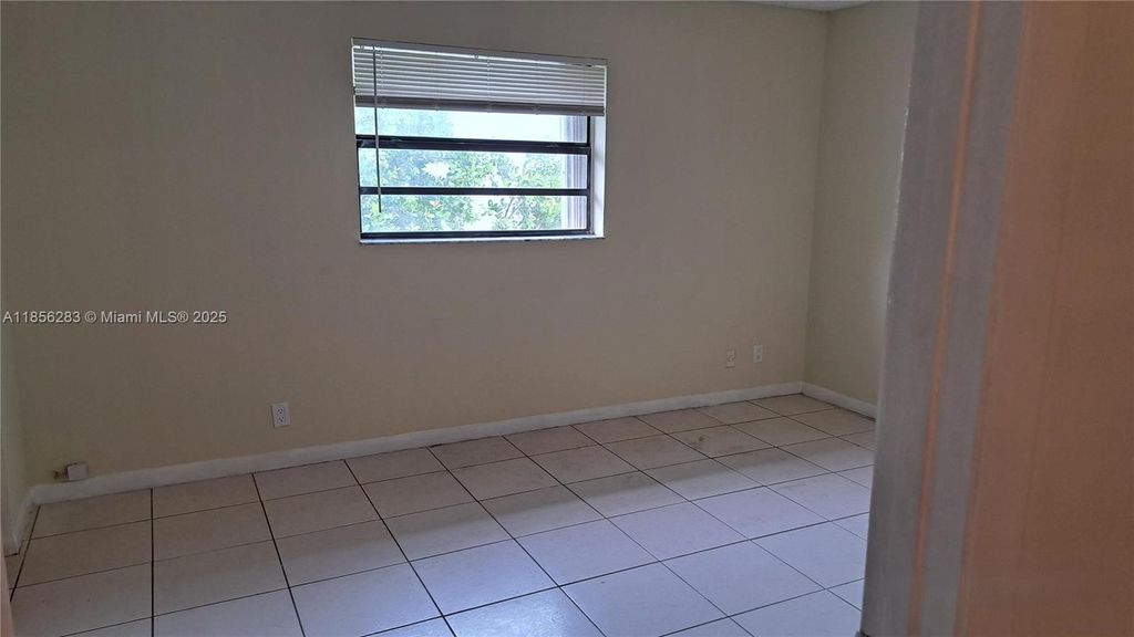 Photo of 11619 NW 27th Ct #4, Coral Springs, FL 33065 (MLS # A11856283)