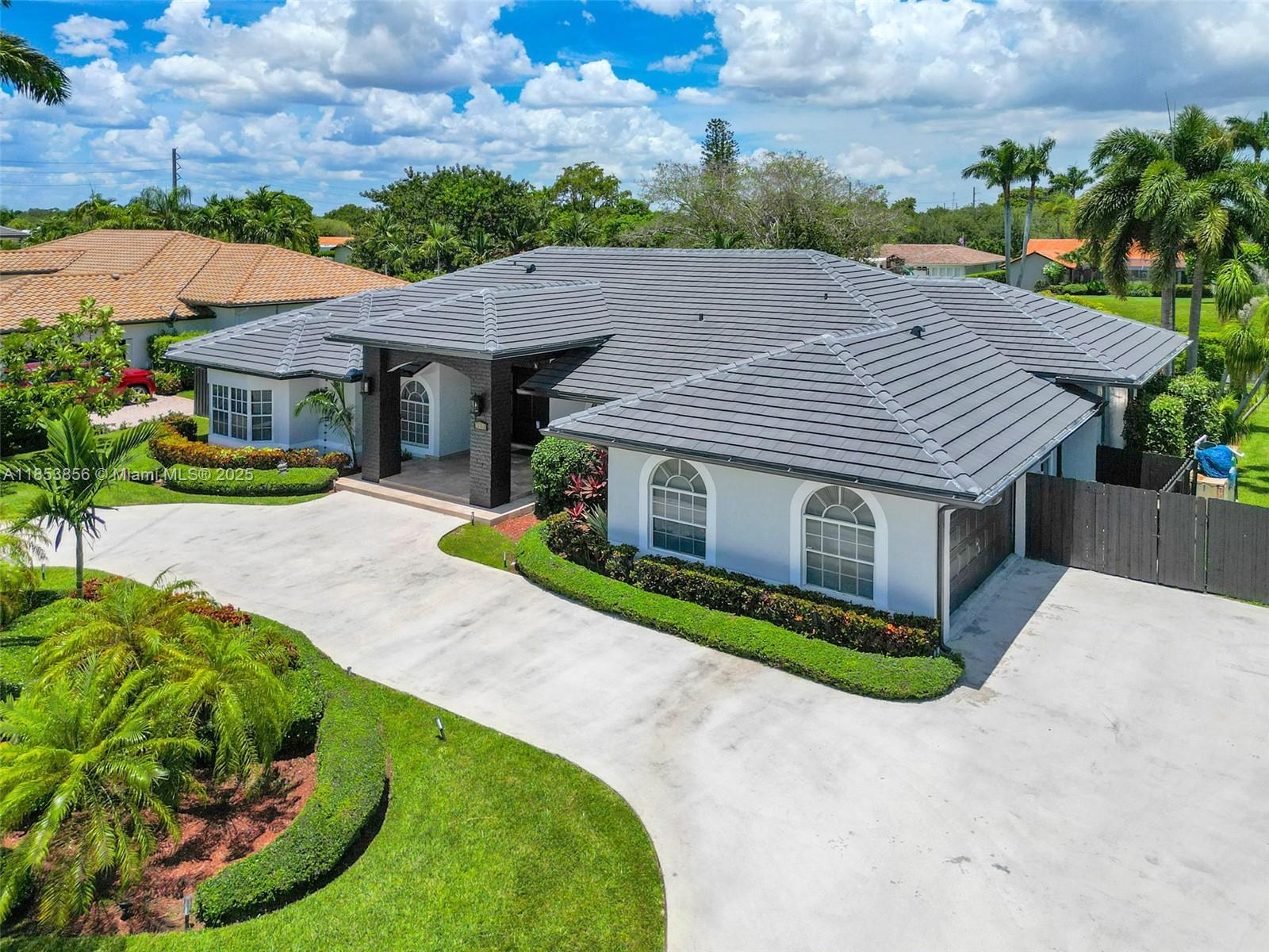 Gorgeous canal-front home featuring 5 bedrooms and 5 bathrooms, ideally located in one of the most desirable residential areas. Enjoy quick access to major highways, the airport, top-rated schools, Dadeland Mall, Baptist Hospital, and a wide variety of dining and shopping options.
This tastefully renovated property boasts fully updated bathrooms, a brand-new front façade, and a new roof. A harmonious layout connects the kitchen, family room, living room, garden, and the beautifully landscaped backyard with a grill area and pool.
Additional features include a separate laundry room, two-car garage, impact windows, and a gas generator — providing safety and comfort throughout hurricane season.