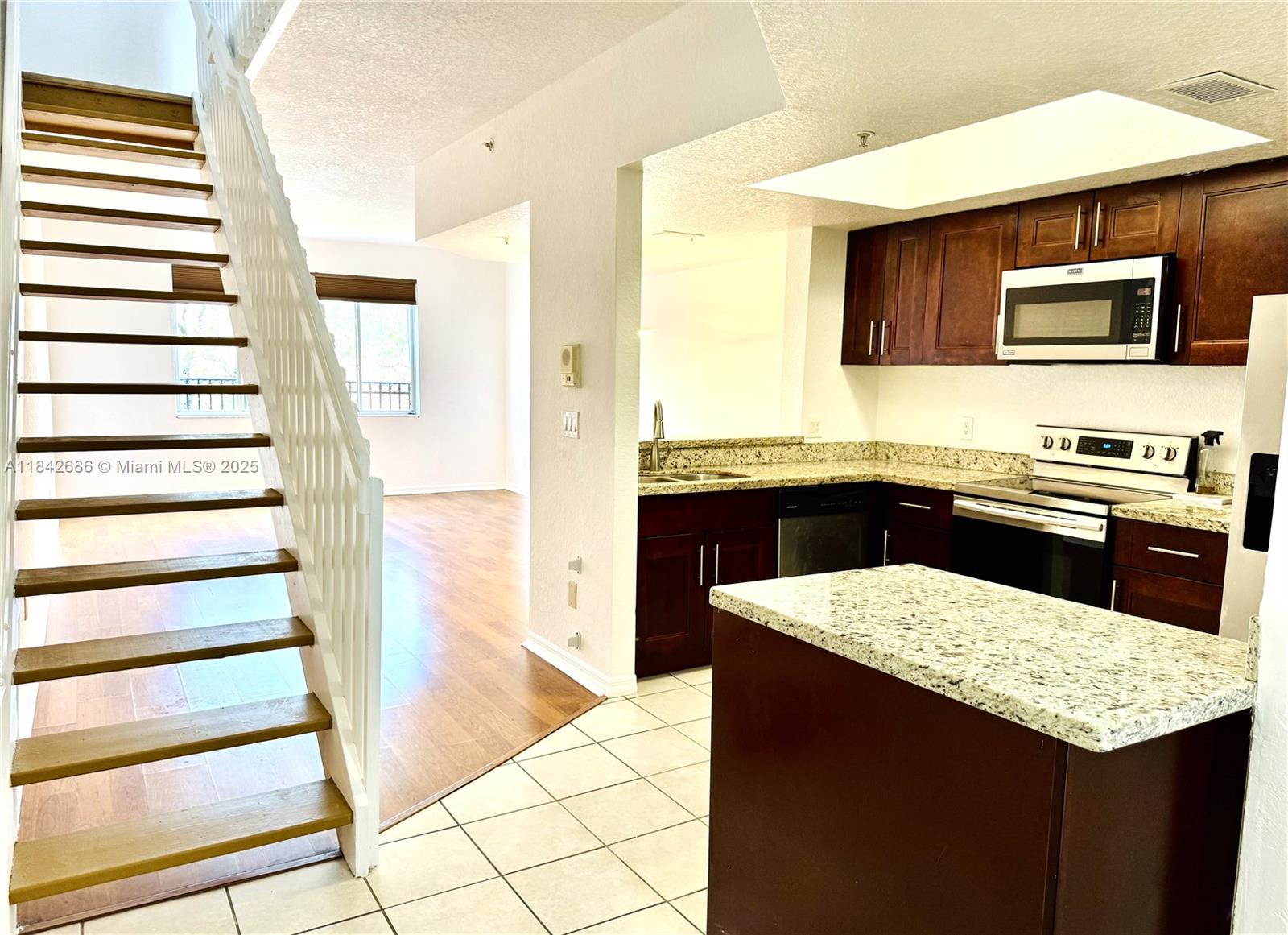 Bright and spacious 3 Bedroom, 3 Bath Condo in Villas De Tuscany. Freshly painted, brand new waterproof plank in all bedrooms, upgraded kitchen with granite countertops, wood cabinet and stainless-steel appliances. Full size washer and dryer in unit. No Carpet. Desirable community with club house, resort style pool and new roof installed in 2024. Near major highways of 595, 869 and 75. Bordering Weston and Davie with wonderful choices of shopping, dining and entertainment. One assigned parking. Vacant easy to show.
